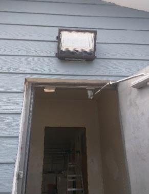 LED Wallpack Installed above a door